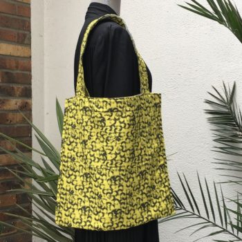 Baltique verso (doublure) toile 100% coton dessin vinyle jaune citron, petits disques noirs sur fond jaune