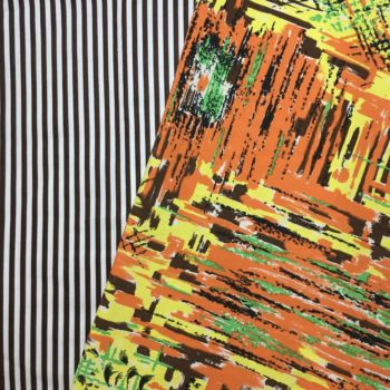 Tissu ancien français Marignan, imprimé de formes libres en orange, vert, brun et jaune, aplats de couleurs striés de noir, et doublure à rayures marron sur blanc.