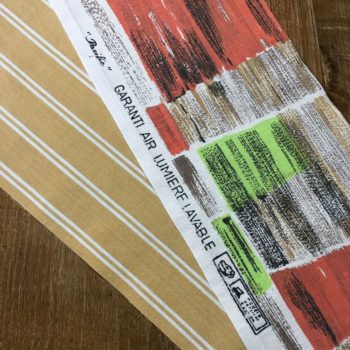 Grand sac origami en tissu d'ameublement vintage revalorisé, Pacific, imprimé de formes libres, motif abstrait multicolore en orange, vert, brun et beige, aplats de couleurs striés de noir.