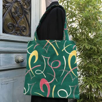 Sac en tissu vintage revalorisé, le totebag Turquoise, imprimé de motifs géométriques abstraits, époque moderne atomique milieu XXe siècle, recto face B.