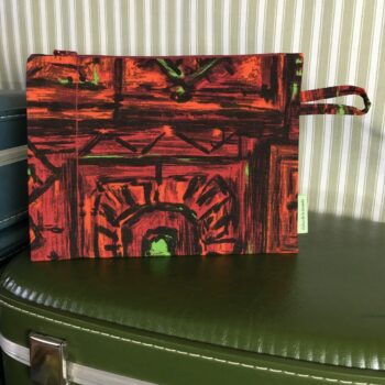 Pochette zippée, dessin ethnique rouge, trousse faite main en France, création originale, tissu vintage revalorisé, accessoire d'inspiration rétro.