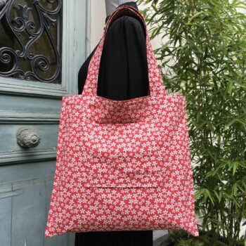 Sac au dessin abstrait rouge, de formes libres. Fourre-tout réversible en tissu vintage revalorisé, accessoire d'inspiration rétro fait main en France. Verso, doublure et poche.
