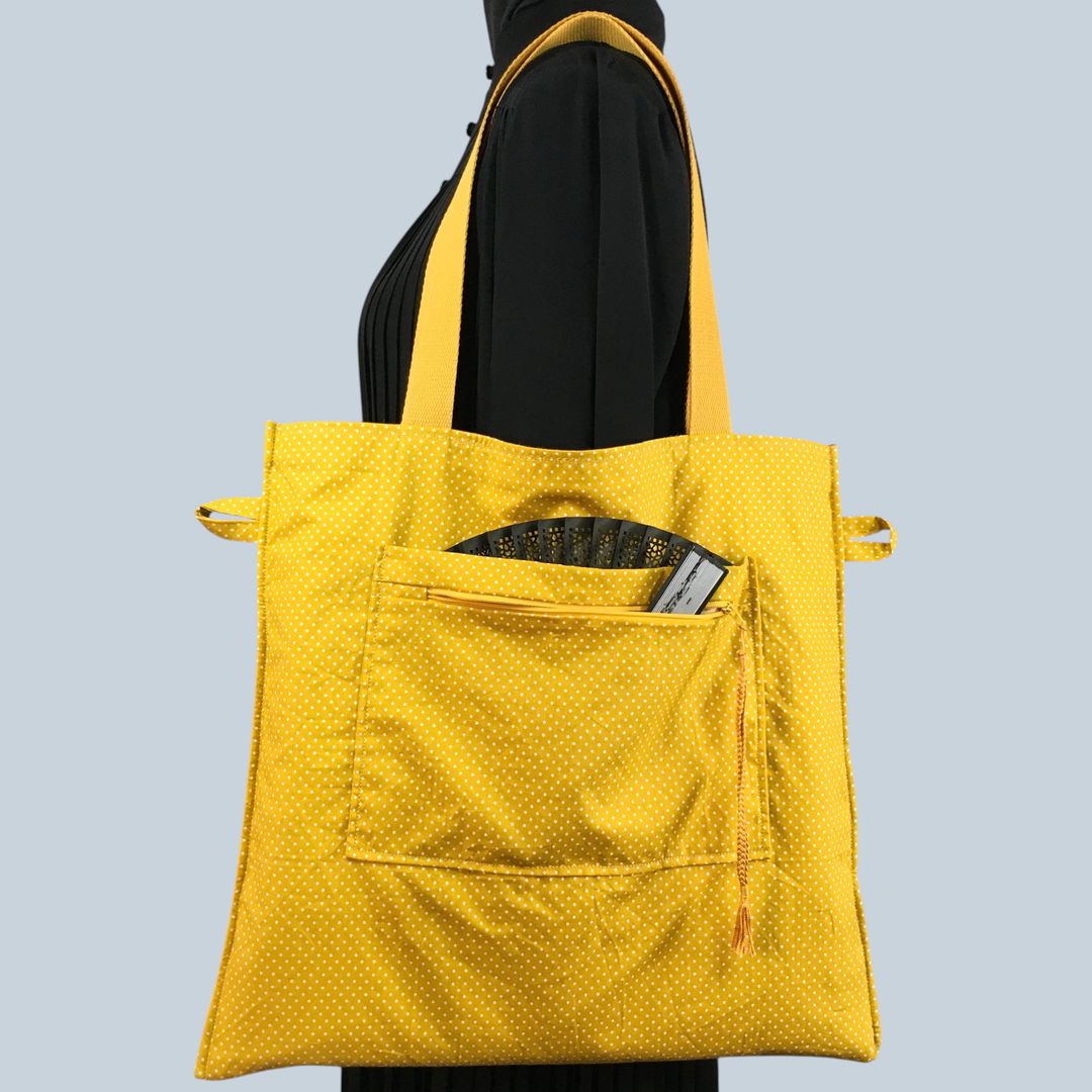 Sac fleuri en laine et lin, fait main en France. Fourre-tout réversible en tissu vintage revalorisé, accessoire d'inspiration rétro. Exemplaire 1. Verso, doublure et poche.