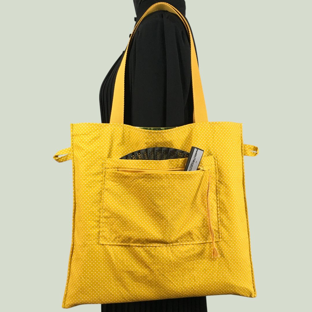 Sac fleuri en laine et lin, fait main en France. Fourre-tout réversible en tissu vintage revalorisé, accessoire d'inspiration rétro. Exemplaire 2. Verso, doublure et poche.