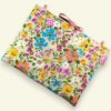 Housse ordinateur 13 pouces Flower Power sixties en toile vintage de 1967, création originale faite main à Paris, étui doublé réversible.